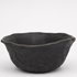 A dark charcoal gray textured ceramic bowl with a hand-painted, hammered finish, shown against a plain white background.