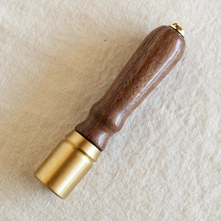 The Solid Brass Mallet