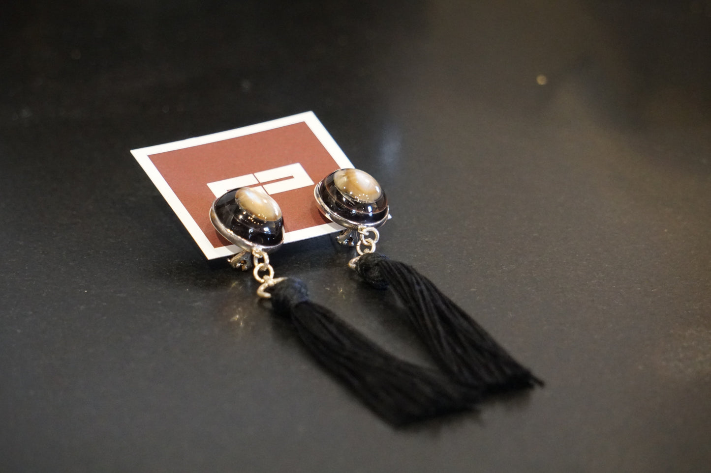 Mother of Pearl Studs with Black Kinkame Silk Tassels